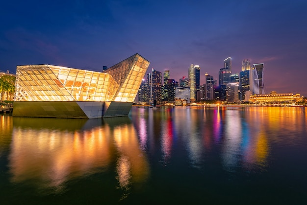 Singapore Skyline and view of skyscrapers on Marina Bay at twilight time.