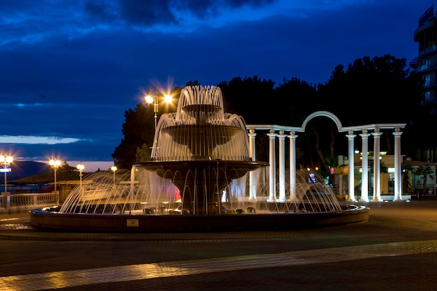 Singing fountain on the promenade of Gelendzhik at sunset