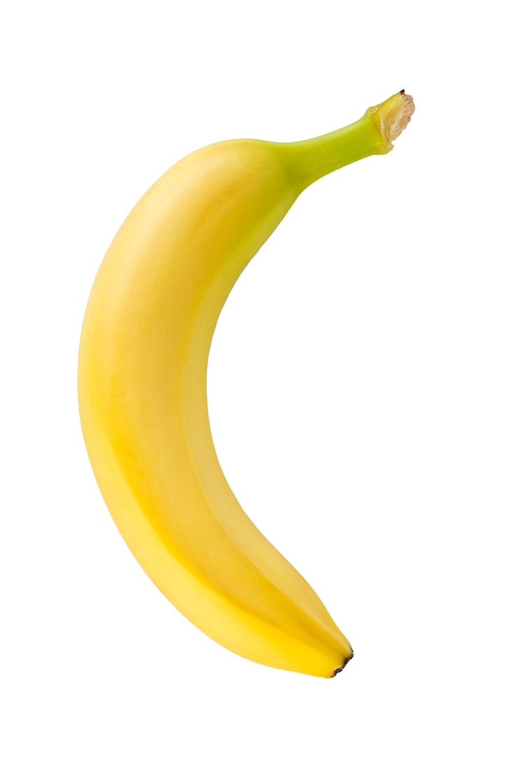 Photo single banana isolated on  white, healthy food, tropical fruit