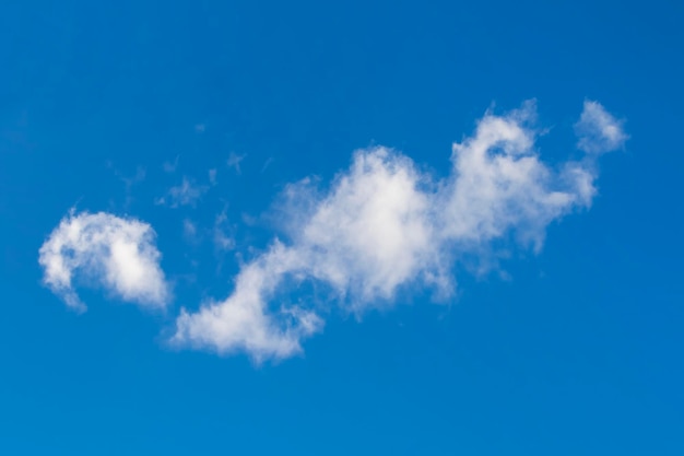 Single beautiful cloud in blue sky