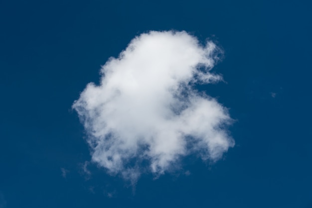 Single cloud on blue sky