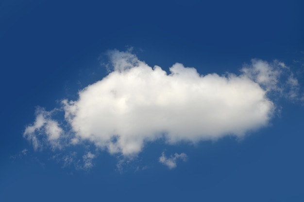 Single cloud isolated over blue sky background