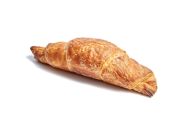 Single croissant isolated on white