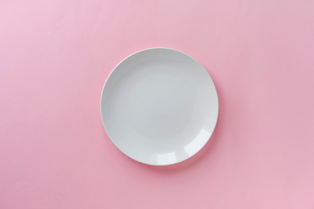 Single empty clean white ceramic plate