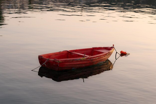 Single fishing boat in still water