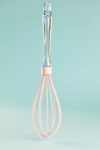 Photo single pink silicone whisk