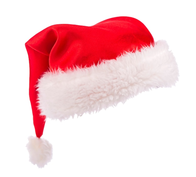 Одинокая красная шляпа Санта-Клауса, изолированные на белой поверхности