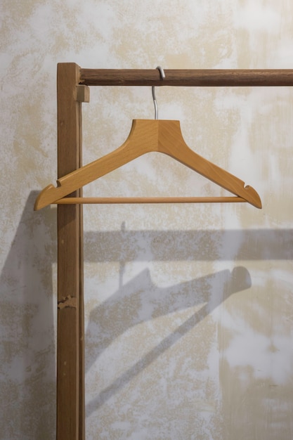 Single wooden hanger on pole