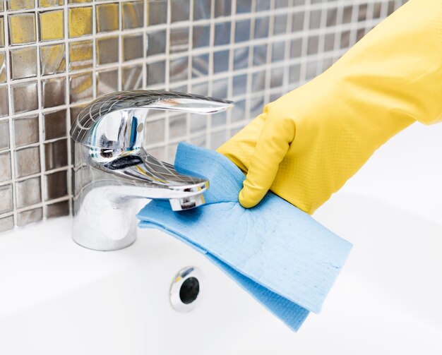 Photo sink faucet getting cleaned