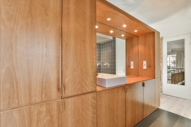 Sink and mirror in modern bathroom