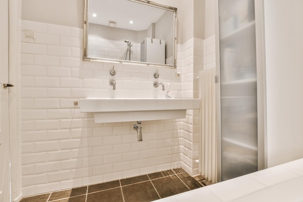 Sink and mirror near bathroom door