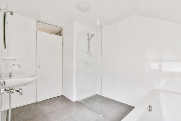 Sinks and bathtub near shower cabin