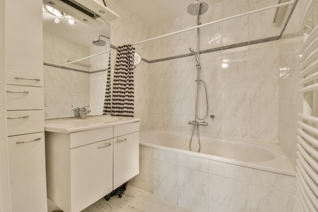 Sinks and bathtub near shower cabin