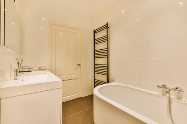 Sinks and bathtub near shower cabin