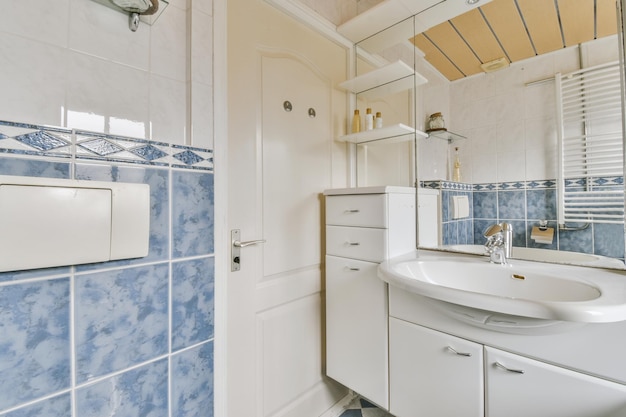 Sinks and bathtub near shower cabin