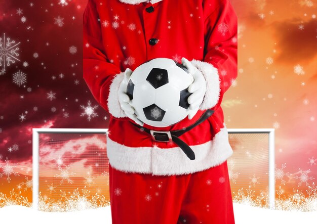 Sinterklaas houdt een voetbal vast