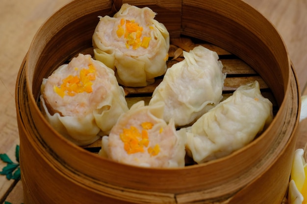 siomay in bamboo steamer. dimsum, dim sum, gyoza, shumai, Chinese, Japanese, Korean dumpling.