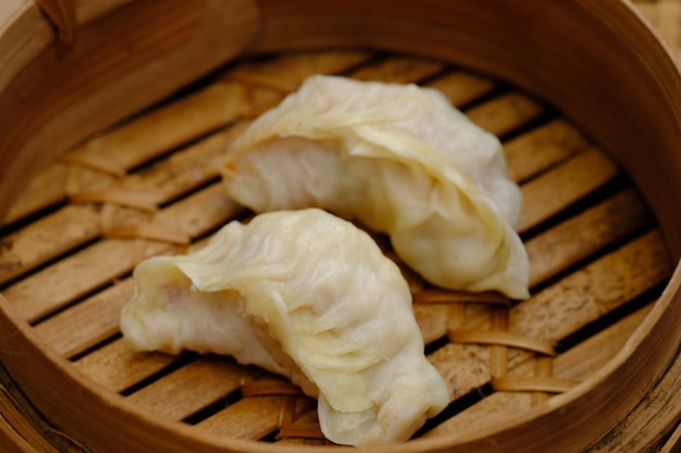 Siomay, shumai, dim sum, dimsum, gyoza on the bamboo steamer. dumpling from china, japan, korea