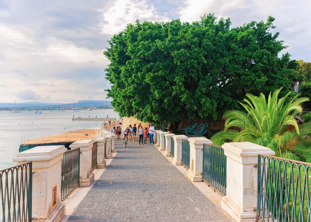 Siracusa, Italy - September 28, 2017: Embankment in Siracusa and the Mediterranean sea, Sicily, Italy