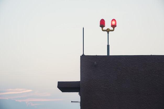  siren on roof deck tower sky