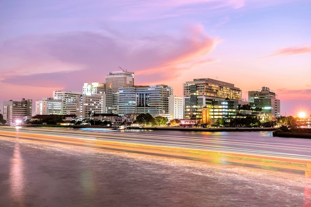 Siriraj Hospital A major government hospital in Bangkok Thailand situated by the Chao Phraya River The beam from the boat that moves through is a beautiful color