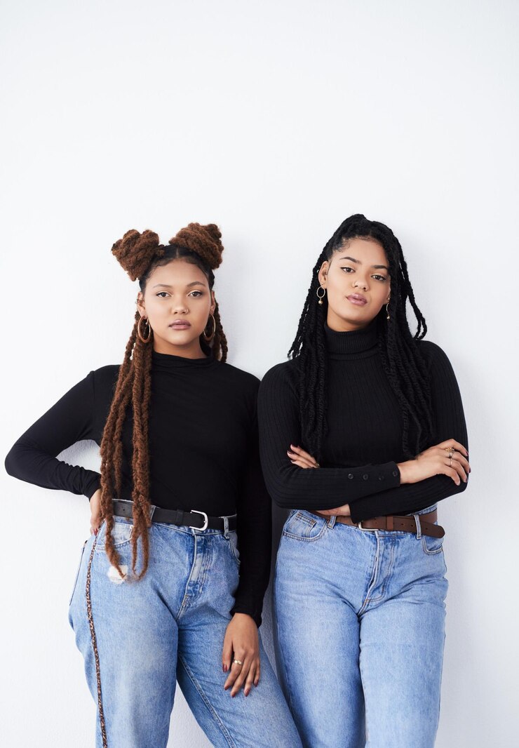 Photo sisters portrait and fashion in studio confident and style bonding on white background women friends and care for relationship on backdrop casual outfit and matching trend for gen z or support