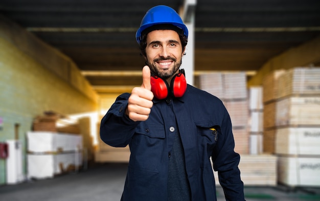 Site construction manager giving thumbs up