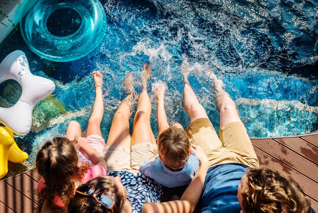 Sitting by the pool with family