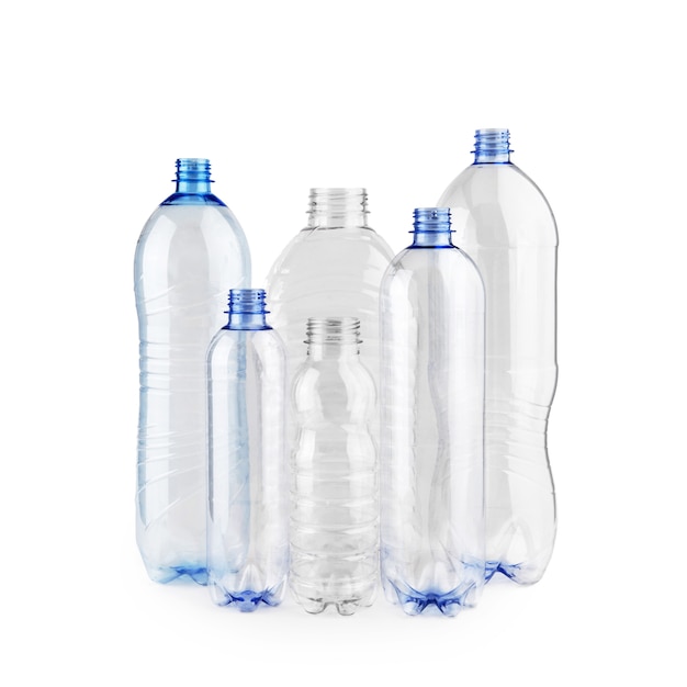 Six diverse new unused blue empty plastic bottles without caps isolated on white background