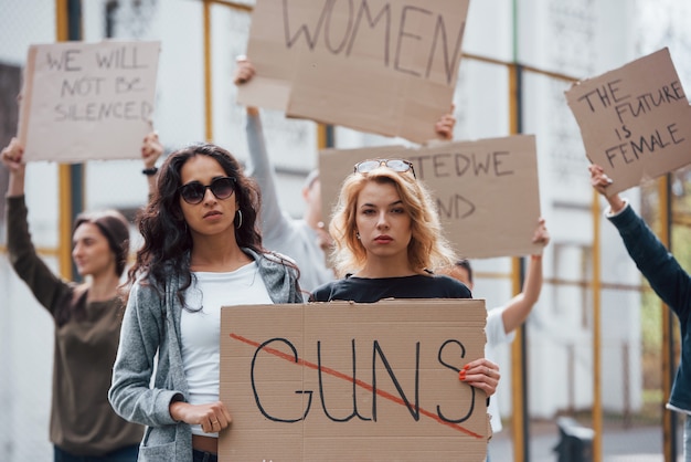 Six people. Group of feminist women have protest for their rights outdoors