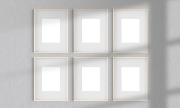 Six wooden frames on a wall mockup 3d rendering