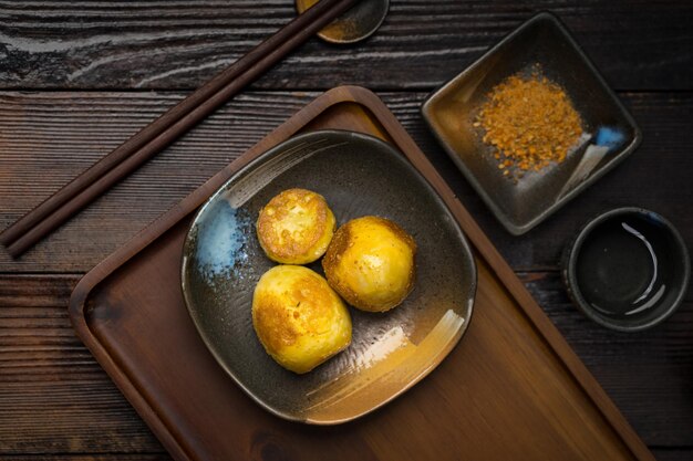 Sizzling eggs on a dark background