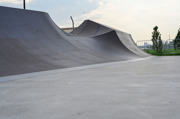 The skate park, rollerdrome, quarter and half pipe ramps.\
extreme sport, youth urban culture for teen street activity.