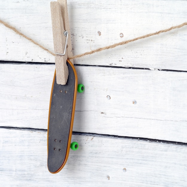 Skateboard on wood background