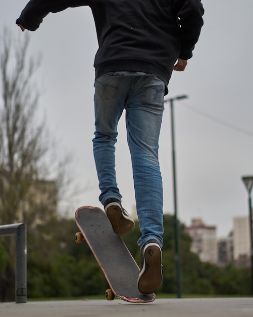 Skateboarder doing jumps on a ramp