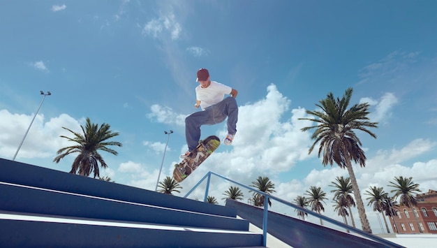 Skateboarder doing a trick in a skate park