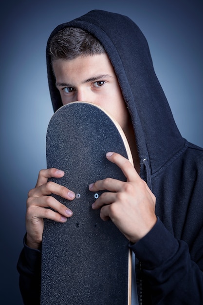 Skateboarder with hoody