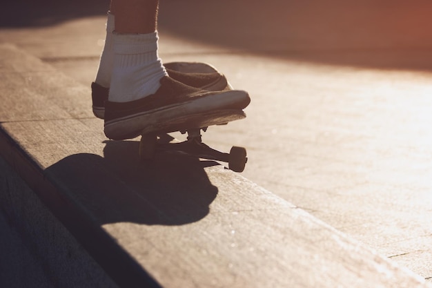 Skater does a grind trick.