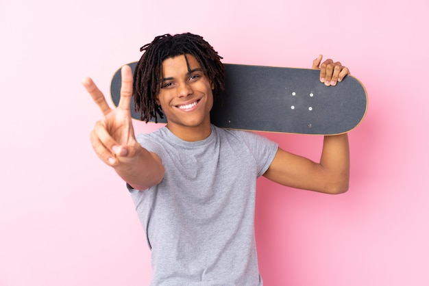 Skater man over isolated wall