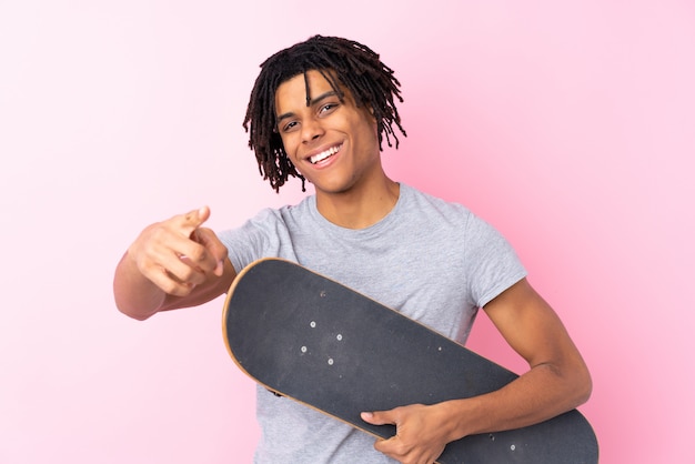 Skater man over isolated wall