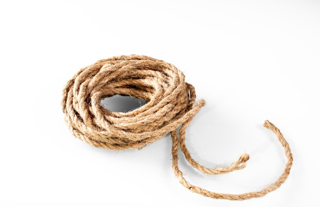 skein of textured rope yarn on white background with shadows