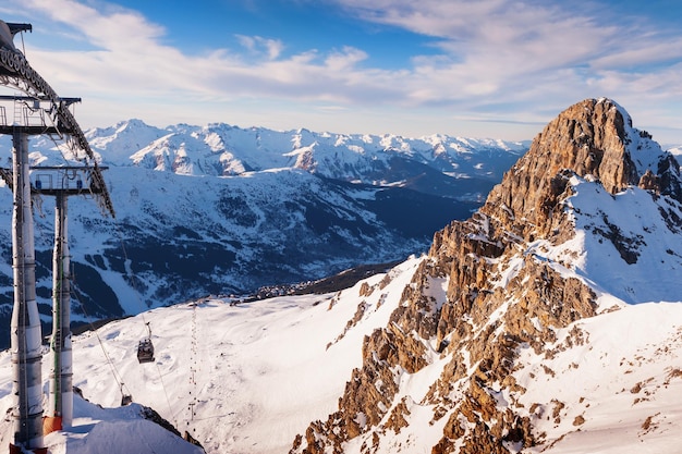 Ski resort in winter Alps mountains France View of gondola lift and ski slopes Meribel France Winter landscape