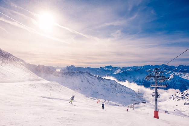 Ski resort in winter Alps. Val Thorens, 3 Valleys, France. Beautiful mountains and the blue sky, winter landscape