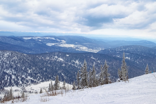 Ski slope in mountains. Ski resort Sheregesh, Siberia, Russia. 