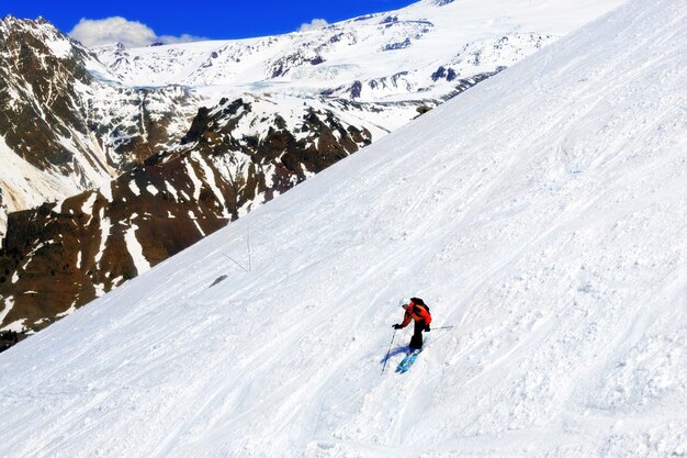 A skier descending Mount Elbrus - the highest peak in Europe.