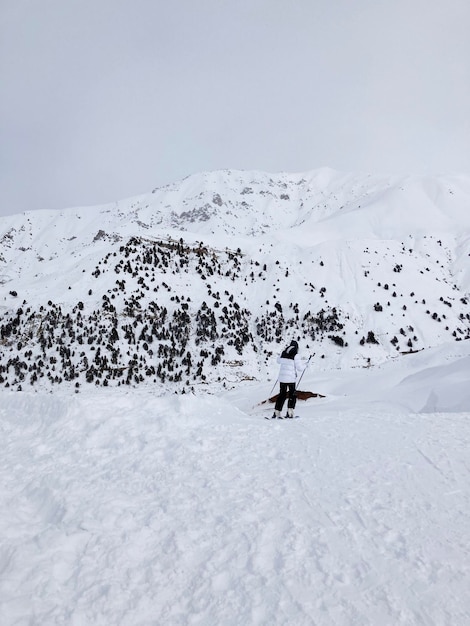 skier going down the slope