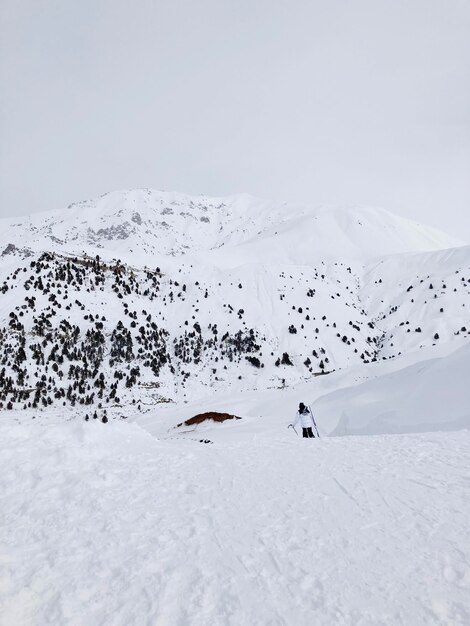 skier going down the slope