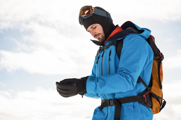 Skier wearing hand gloves