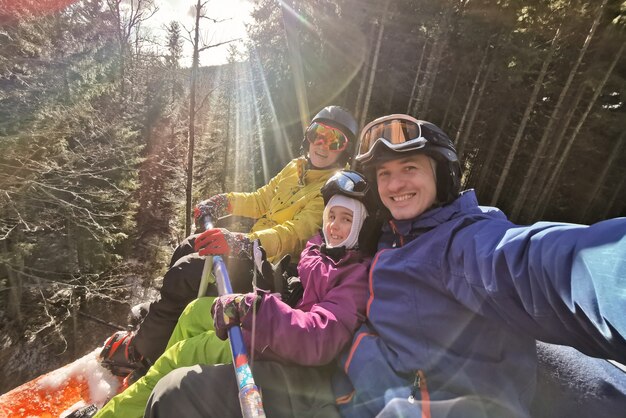 Photo skiing, ski lift, winter - skiers on ski lift