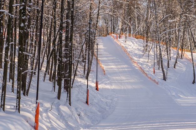 Skiing and snowboarding in Moscow region hills.